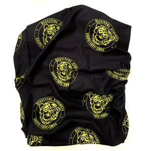 Deceitful Strength Neck Gaiter Face Mask. Gaiter Monkey design featuring black base with multiple checkered infamous monkey head logos in neon yellow.